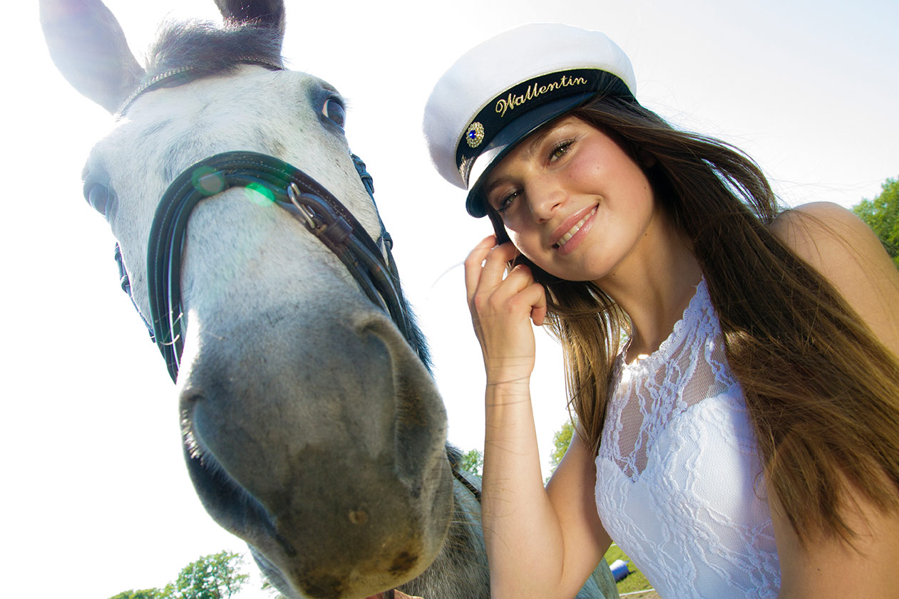 A girl with her horse at her highschool exam
